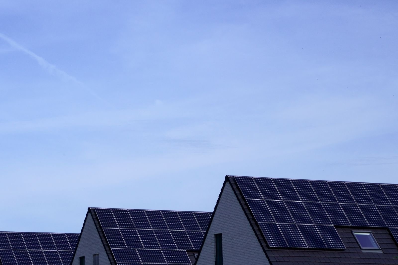 Modern Houses with Rooftop Solar Panel Installation